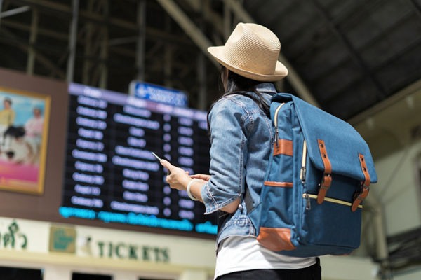 Young woman at train station