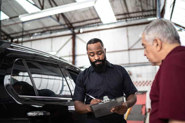 Mechanic with customer