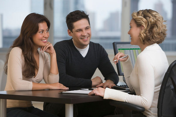 Young couple meeting with advisor